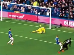  ??  ?? Howler: the ball squeezes under Pickford and into the net