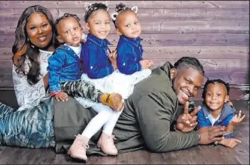  ?? Porschia Harris ?? Draya Harris, 5, third from left, with her family. The family created an online fundraiser to raise money for medical expenses after she was struck by a stray bullet.