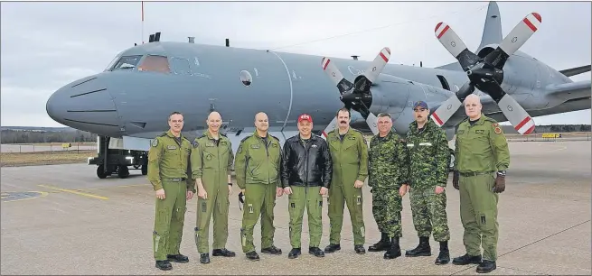  ?? SUBMITTED ?? This crew from 14 Wing Greenwood recently flew a CP-140 Aurora to Vimy-ridge, Que., for a fly-by honouring the 100th anniversar­y of the Battle of Vimy Ridge. Pictured from left, Warrant Officer Ian Perreault, Lt.-col. Illo Neri, Major Yves Leblanc,...