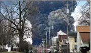  ?? GENE J. PUSKAR, FILE - THE ASSOCIATED PRESS ?? A black plume rises over East Palestine, Ohio, as a result of the controlled detonation of a portion of the derailed Norfolk Southern trains Monday, Feb. 6, 2023.