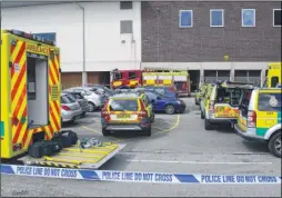  ?? Pictures: Gary Browne/Paul Amos ?? Ashford Leisure Trust chief executive Emma Wood and emergency services vehicles outside the centre following the chlorine scare