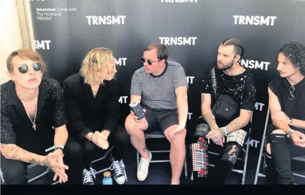  ??  ?? Interview Derek with The Hunna at TRNSMT