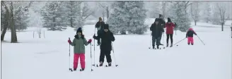  ?? ?? World Snow Day participan­ts ski along the groomed trail at the Chinook golf course in Swift Current.