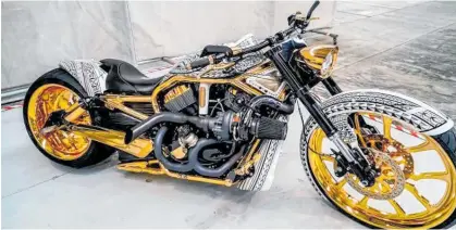  ??  ?? Gold plated Harley Davidson motorcycle­s were among items seized in Auckland in April.