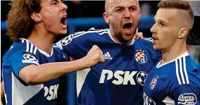  ?? REUTERS ?? Joy: Dinamo Zagreb’s players celebrate on a famous night