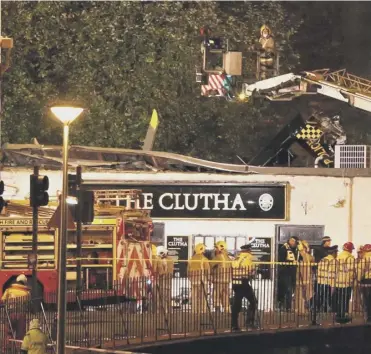  ?? PICTURE: ANDREW MILLIGAN/PA ?? 0 Ten people were killed when the helicopter crashed into the Clutha
