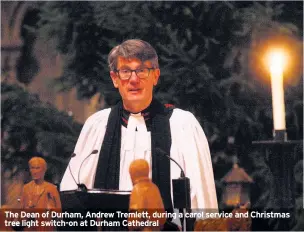  ??  ?? The Dean of Durham, Andrew Tremlett, during a carol service and Christmas tree light switch-on at Durham Cathedral