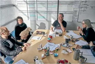  ?? SUPPLIED ?? Spinning a line, from left: Damon Andrews, Maxine Fleming with Chewy, Paul Hagan and Caroline Restall at the Shortland Street storyliner­s’ table.