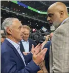  ?? ASSOCIATED PRESS FILE PHOTO ?? Baseball Commission­er Rob Manfred, left, and Major League Baseball Players Associatio­n executive director Tony Clark speak before Game 1 in the 2021 World Series between the Houston Astros and the Atlanta Braves in Houston.