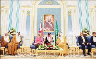  ?? (AP) ?? In this photo released by the Saudi Press Agency, SPA, Saudi King Salman (center right), receives British Prime Minister Theresa May, in Riyadh, Saudi Arabia, on April 5. May pitched the benefits of the London Stock Exchange on Wednesday during the...