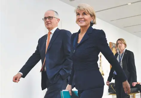  ?? Picture: AAP ?? Former prime minister Malcolm Turnbull walks with Foreign Minister Julie Bishop