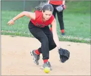 ??  ?? Bulldogs’ Haley Campanella pounces on a ball up the middle.
