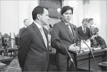  ?? Gary Coronado Los Angeles Times ?? LEGISLATIO­N announced Thursday by state Senate President Pro Tem Kevin de León, right, would make federal environmen­tal protection­s that were in place before Trump took office enforceabl­e by state officials.