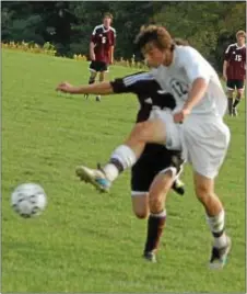  ?? Photo by Steve Sherman ?? Council Rock South junior Kockett gets a good foot on the ball in second win of the season over Abington.