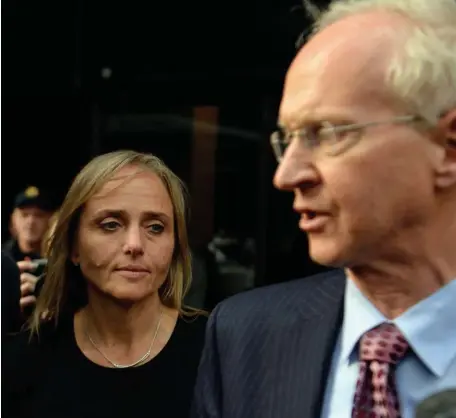  ?? CHRISTOPHE­R EVANS PHOTOS / HERALD STAFF FILE ?? ON TRIAL: Judge Shelley Richmond Joseph, top and with her lawyer above, leaves the Moakley Federal Courthouse in Boston on April 25.