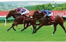  ?? Rex Features ?? Ribchester, ridden by James Doyle (in blue), finishes third to The Gurkha and Galileo Gold in the Qatar Sussex Stakes.