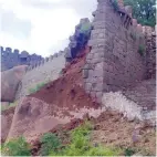  ??  ?? A portion of the wall in front of the Sri Jagadambik­a Devi temple in the Golconda fort collapsed due to rain on Saturday.