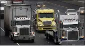  ?? BEN MARGOT — THE ASSOCIATED PRESS FILE ?? Trucks make their way eastbound in Livermore.
