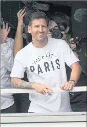  ?? FRANCOIS MORI — THE ASSOCIATED PRESS ?? A happy Lionel Messi arrives in France, where he’ll make a reported $41 million per year with Paris Saint-Germain.