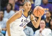  ?? MICHAEL JOHNSON/THE ADVOCATE ?? LSU forward Angel Reese dribbles upcourt in the first quarter of Sunday’s win against Northweste­rn State.