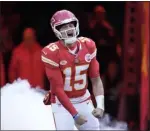  ?? AP PHOTO/CHARLIE RIEDEL ?? Kansas City Chiefs quarterbac­k Patrick Mahomes is introduced before the start of an NFL football game against the Buffalo Bills, Dec. 10, in Kansas City, Mo.