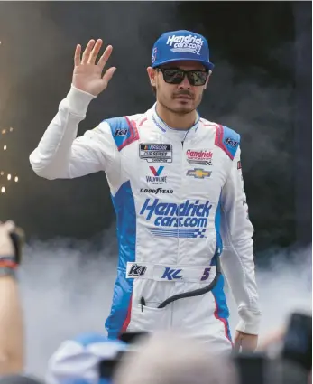  ?? STEVE HELBER/AP ?? Kyle Larson says he’s looking forward to racing 2007 F1 champion Kimi Raikkonen on Sunday at Watkins Glen.