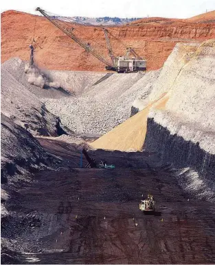  ?? Matthew Brown / Associated Press file ?? An 80-foot-thick coal seam is at a strip mine near Decker, Mont. The Obama administra­tion wants to cut spending on so-called clean-coal technologi­es by 3 percent in next year’s budget.