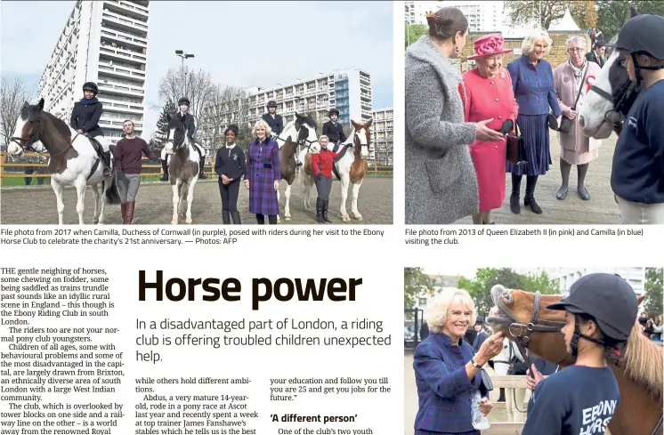  ??  ?? File photo from 2017 when Camilla, Duchess of Cornwall (in purple), posed with riders during her visit to the Ebony Horse Club to celebrate the charity’s 21st anniversar­y. — Photos: AFP File photo from 2013 of Queen Elizabeth II (in pink) and Camilla (in blue) visiting the club. Camilla’s interest in the club over the years has drawn royal attention with Queen Elizabeth also visiting to stamp her approval on its activities.