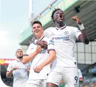  ??  ?? Chelsea goalscorer­s Mason Mount and Tammy Abraham celebrate Mount’s 17th minute strike