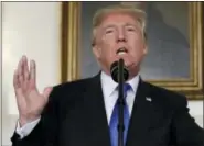  ?? EVAN VUCCI — THE ASSOCIATED PRESS ?? President Donald Trump speaks on Iran policy from the Diplomatic Reception Room of the White House in Washington on Friday.