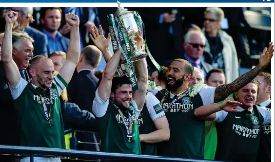  ??  ?? Waiting is over: Stevenson lifts the Scottish Cup last May as Hibernian end their 114-year hoodoo after defeating Rangers in the Final at Hampden