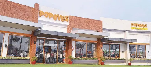  ??  ?? Popeyes Philippine­s is the first to unveil the restaurant’s new global image.