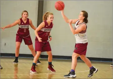  ?? KELVIN GREEN/TRI-LAKES EDITION ?? Cayla Clayton makes a shot as she is defended by Kati Morrow during a Lady Panthers practice.