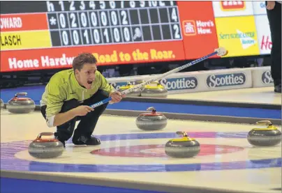  ?? JASON SIMMONDS/JOURNAL PIONEER ?? Skip Adam Casey yells instructio­ns to his sweepers during Tuesday’s game against Jamie Murphy at the 2017 Home Hardware Road to the Roar Pre-Trials curling event in Summerside. Murphy won the game 9-5. Casey, who is from Seven Mile Bay and skipping a...