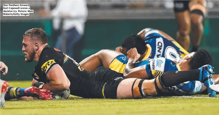  ??  ?? Star Panthers forward Kurt Capewell scores a decisive try. Picture: Matt Roberts/Getty Images