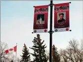  ?? ?? The banners of Steven Senyk and John Burnett are installed in Memorial Park.