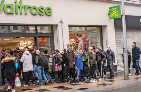  ??  ?? Crammed: Shoppers at Waitrose in London’s Clapham Junction