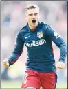  ??  ?? This file photo taken on March 19, 2016 shows Atletico Madrid’s French forward Antoine Griezmann celebratin­g after scoring a goal during the Spanish League football match Real Sporting de Gijon vs Club Atletico de Madrid at El Molinon
Stadium in...