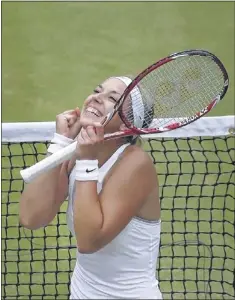  ?? ANJA NIEDRINGHA­US/ASSOCIATED PRESS ?? Sabine Lisicki followed up her stunning upset of Serena Williams on Monday with a workmanlik­e victory over Kaia Kanepi on Tuesday to advance to the semifinal round of Wimbledon. Joining her are three other players who have never won a Grand Slam...