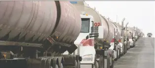  ?? BRANDON HARDER ?? Fuel trucks wait along Fleet Street earlier this month outside of the Co-op Refinery Complex.