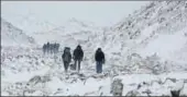  ?? AP FILE ?? Trekkers near the Everest Base camp in Lobuche.