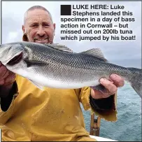  ??  ?? ■
LUKE HERE: Luke Stephens landed this specimen in a day of bass action in Cornwall – but missed out on 200lb tuna which jumped by his boat!