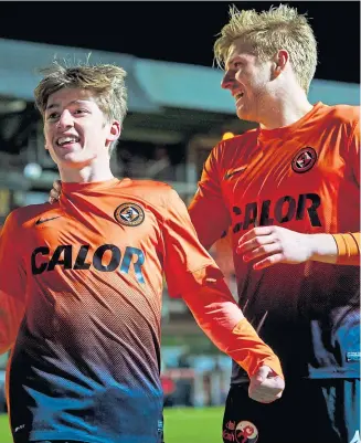  ??  ?? Gauld celebrates with Stuart Armstrong after scoring a goal for United.