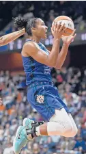  ?? SEAN D. ELLIOT/AP ?? Sun forward Alyssa Thomas drives to the basket during a playoff game against the Chicago Sky on Thursday.