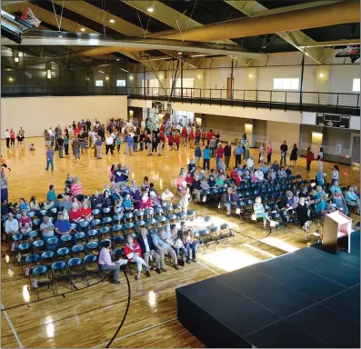  ??  ?? Residents gather in the gymnasium of the new Batesville Community & Aquatics Center for its grand-opening ceremony June 8.