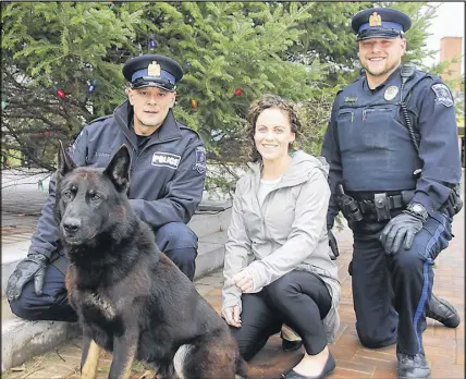  ?? LYNN CURWIN/TRURO DAILY NEWS ?? The Truro Police Service is hosting a Holiday Heroes event for children who would otherwise not be able to experience what most people take for granted during the holiday season. Some of those involved in the event are K-9 United Const. Scott Milbury...