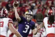  ?? TONY AVELAR — THE ASSOCIATED PRESS ?? Washington quarterbac­k Jake Browning throws a pass against Utah during the Pac-12 championsh­ip on Nov. 30.