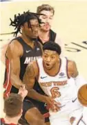  ?? AP ?? Elfrid Payton and Knicks hit a wall against Heat on Monday.