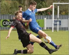  ??  ?? Martin O’Connor times this tackle on Seán Roche to perfection.