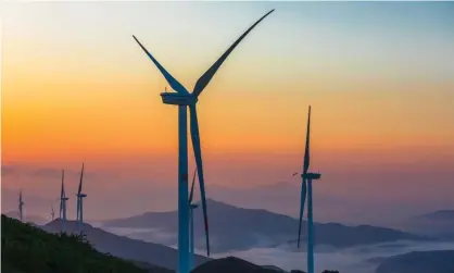  ?? Photograph: VCG/Getty ?? Wind turbines on mountains in Henan province, China.